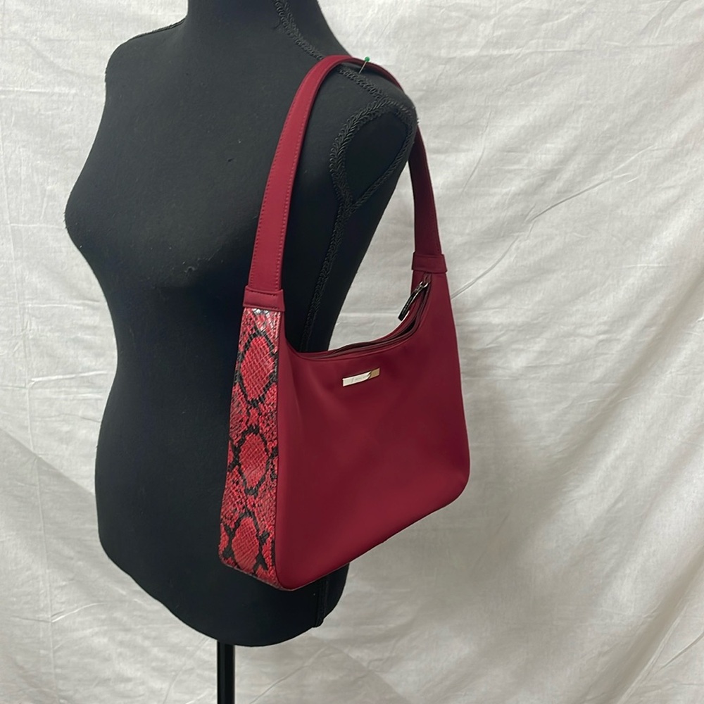 Nine West red shoulder cloth purse with faux python skin on sides and bottom